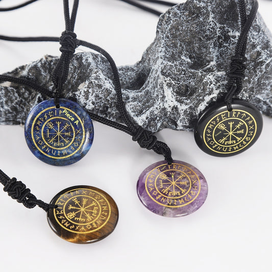 Four stone pendants withRunes on a white background