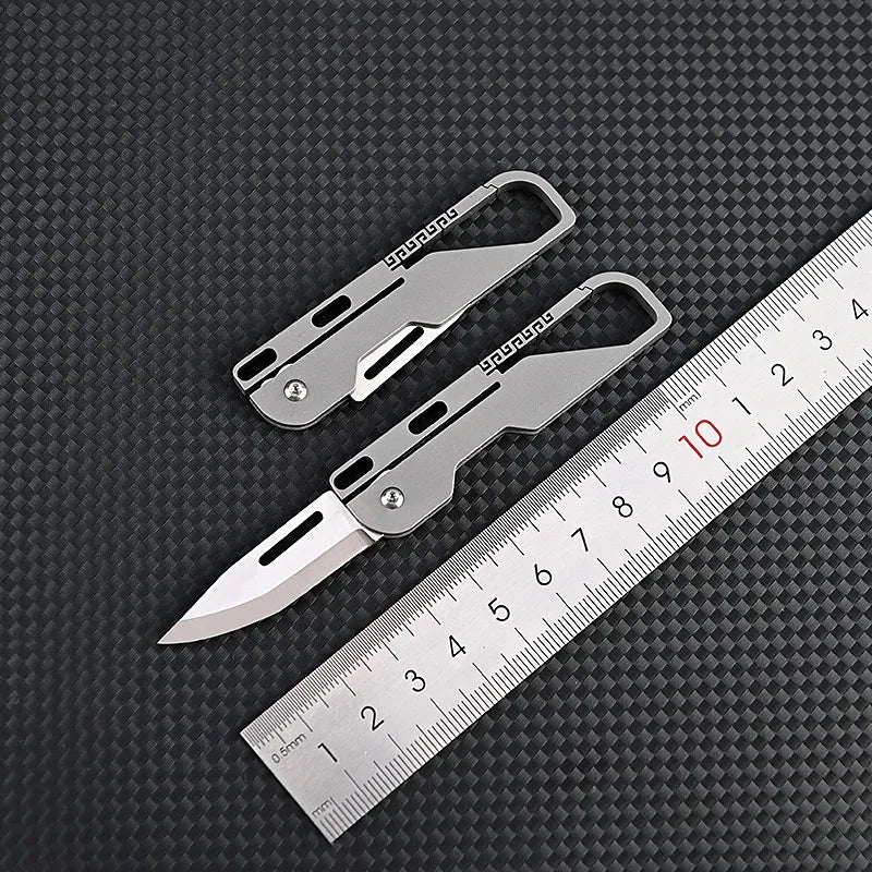 Compact and Mighty: MGS Titanium Alloy MINI Folding Knife with High Hardness D2 Blade – A Keychain Pendant Pocket Knife for Outdoor EDC and Self-defense - Man Gifts Shop