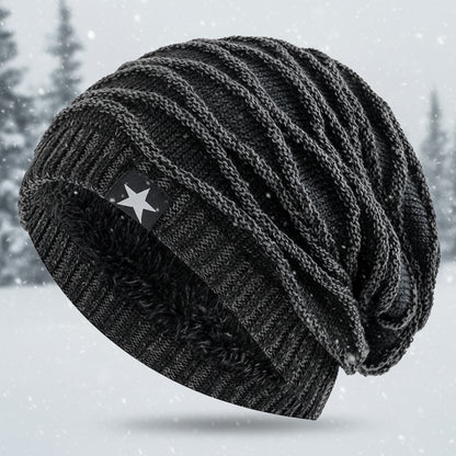 Dark gray knit beanie with a star patch on a white background