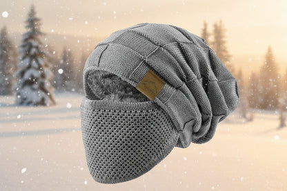 Gray knit beanie with textured pattern on a white background