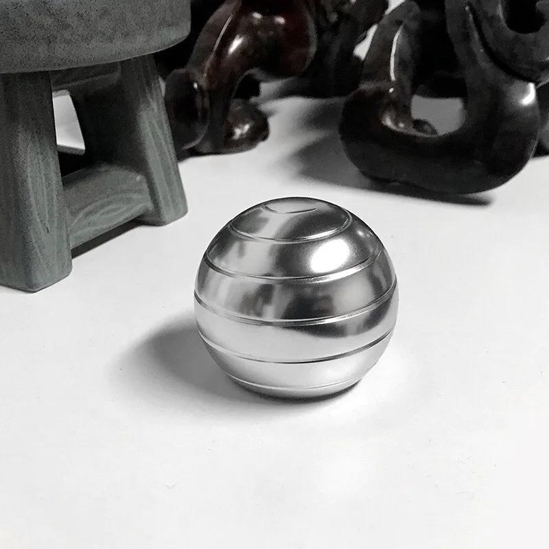 Desk Stress Relief: The Hypnotic Rotating Spherical Gyroscope Fidget Toy - Man Gifts Shop