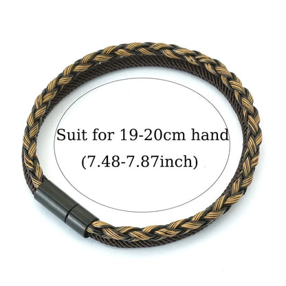 Bracelet with braided design and black and gold color scheme on a white background