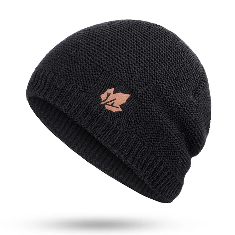 Black knit beanie with a rose gold logo on a white background
