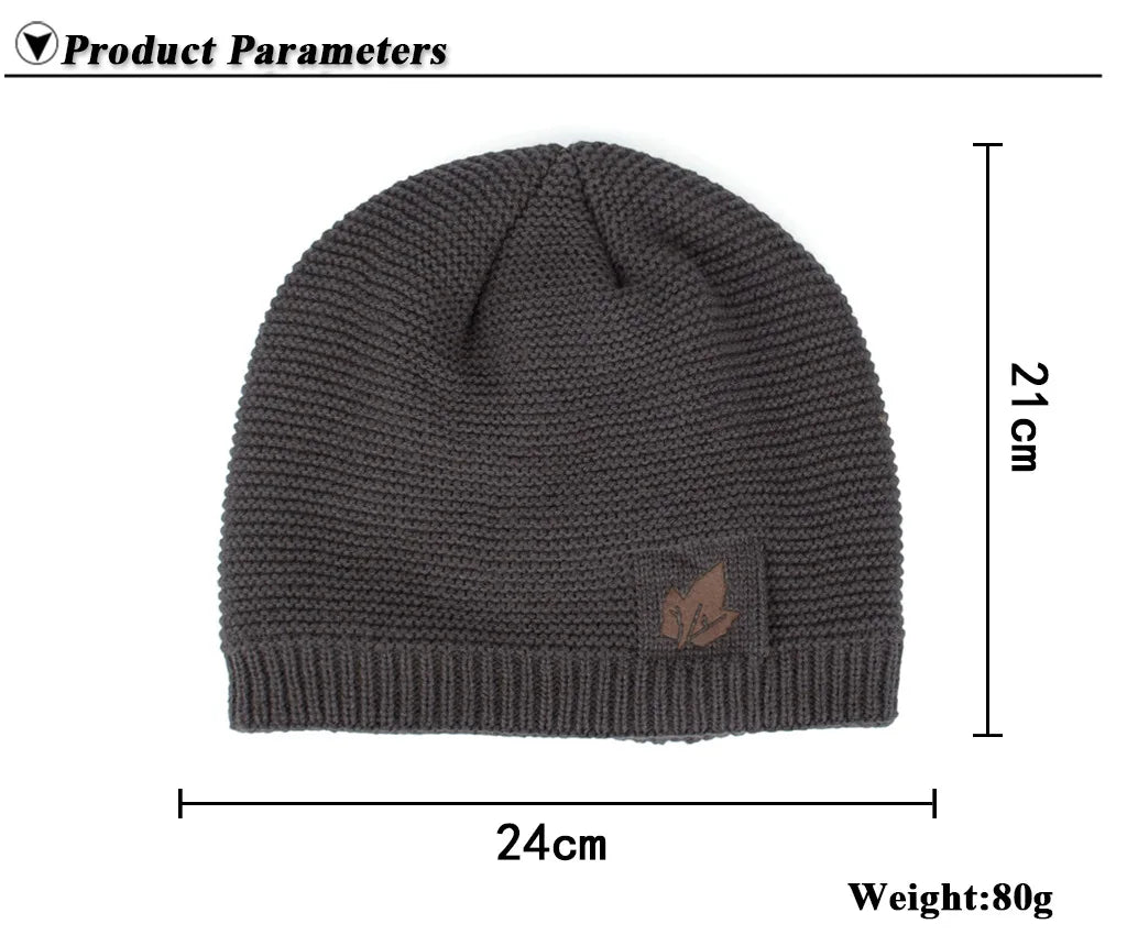 Gray knit beanie with a small logo on a white background, showing measurements and weight.