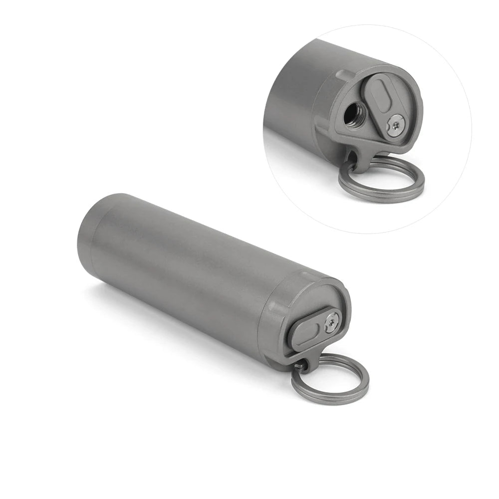 Gray cylindrical container with a key-like mechanism on a white background, featuring the brand 'Advance'.