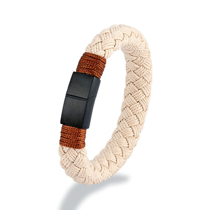 Bracelet with braided design and black and brown accents on a white background